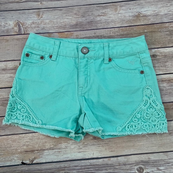 mint green denim shorts